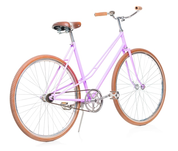 De roze fiets van modieuze vrouwen die op wit wordt geïsoleerd