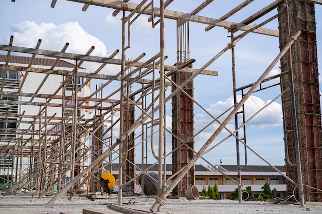 De structuurachtergrond van de bouwwerf En nieuwe gebouwen met meerdere verdiepingen Industriële achtergrond