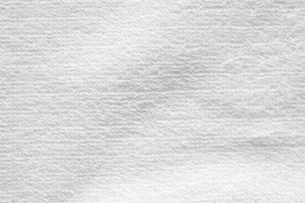 De textuur abstracte achtergrond van de close-up de witte katoenen handdoek