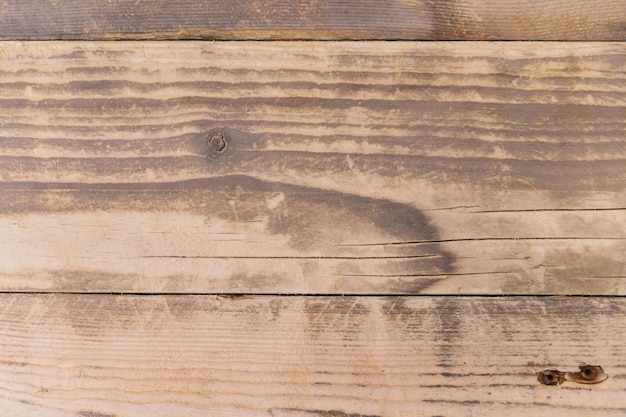 De textuur van de boom. Natuurlijk patroon op een houten ondergrond. Timmerwerk. Platte houten planken.