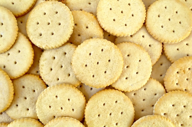 De textuur van de gele ronde crackers