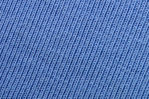 De textuur van de stof in blauw