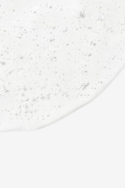De textuur van het serum of de gel Transparante crème met bubbels op de achtergrond Transparante cosmetische gel in close-up xAOxygen bubbels xA
