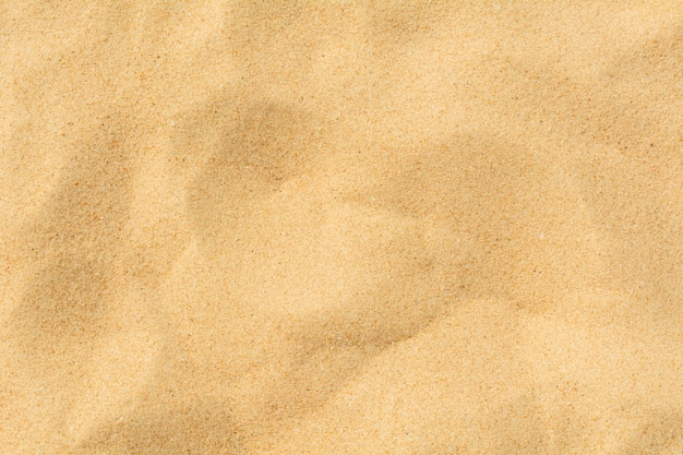 De textuur volledig kader van het zand als achtergrond