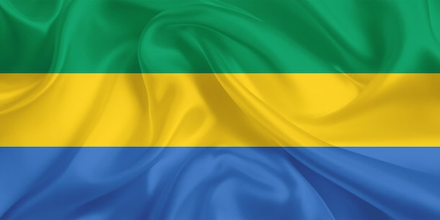 De vlag van Gabon zwaait in de lucht