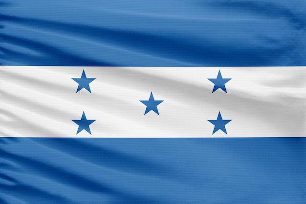 De vlag van Honduras is afgebeeld op een sportstitch doek met plooien
