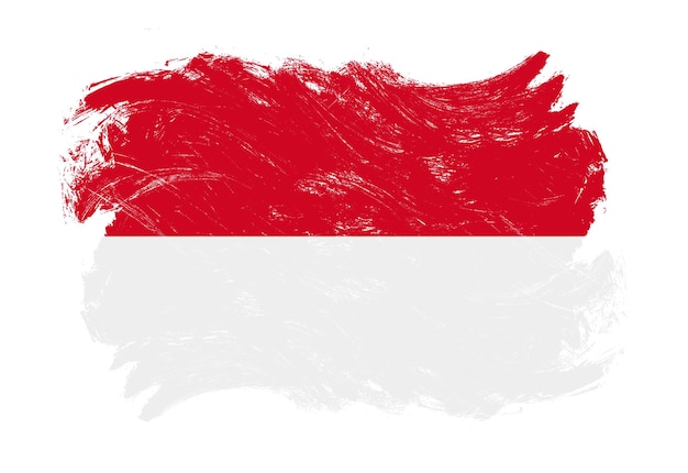 De vlag van Monaco op de verontruste achtergrond van de grunge witte slagborstel