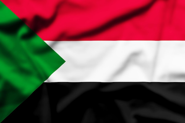 De vlag van Soedan zwaaien