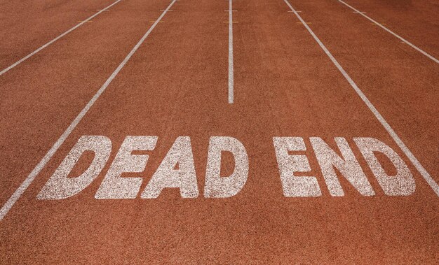 Dead End written on running track New Concept on running track text in white color