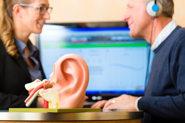 Photo deaf man makes a hearing test