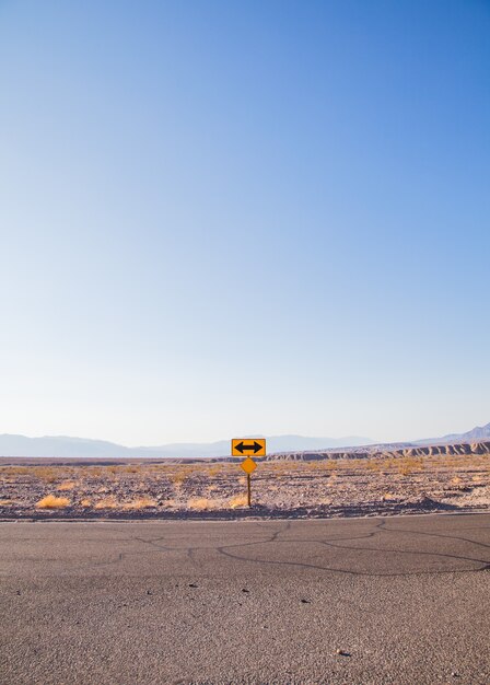 Death Valley, California. Direction sign in the middle of the desert.