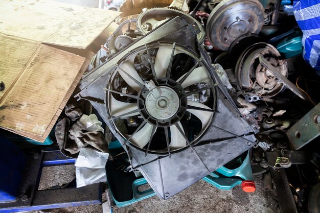 Debris of Car engine  in the car repair garage.