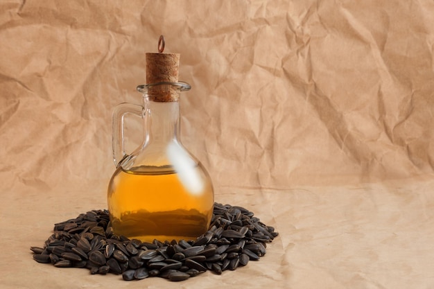 Decanter with sunflower oil on seeds