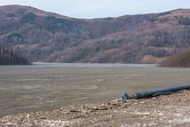 Decanting lake pipe installation treatment with lime and gypsum for purification of water of heavy metals Geamana Poieni Rosia Montana Romania