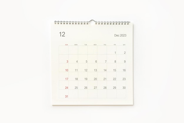 写真 2023 年 12 月カレンダー ページ リマインダー ビジネス計画の予定会議とイベントの白いカレンダーの背景