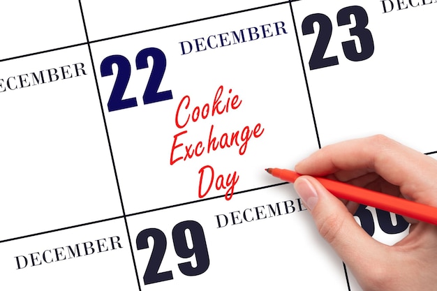 Photo december 22 hand writing text cookie exchange day on calendar date save the date holiday day of the year concept