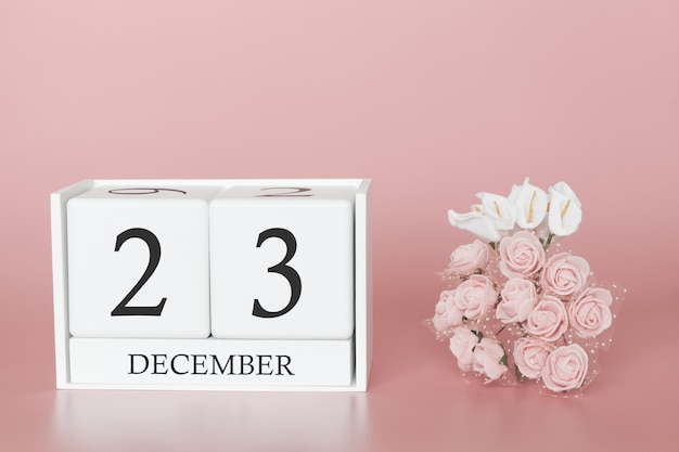 23 dicembre. giorno 23 del mese. cubo calendario su sfondo rosa moderno, concetto di bussines e un evento importante.