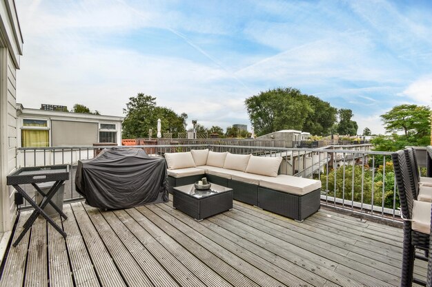 The deck has a couch and a table on it