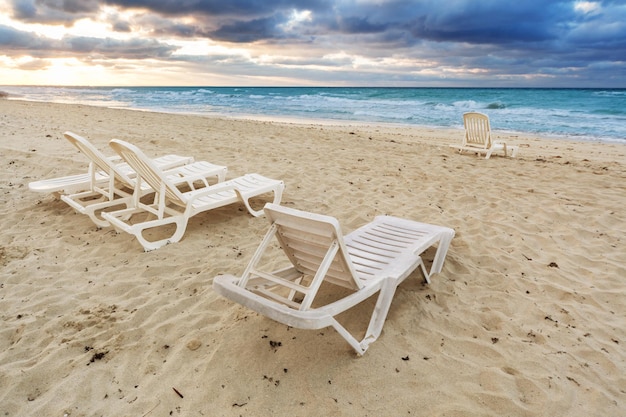 Deckchairs on beach