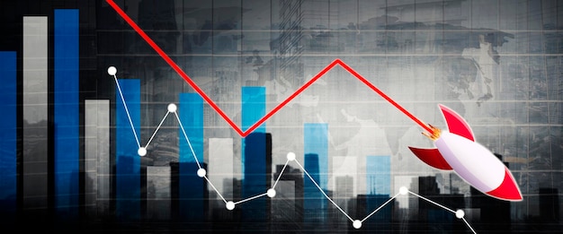 Photo declining chart and falling rocket with world map