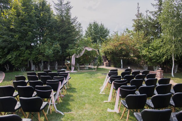 Decor of arches and chairs for the wedding ceremony