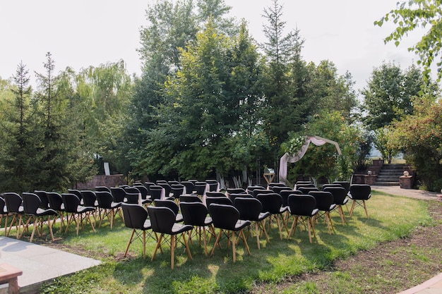 Decor of arches and chairs for the wedding ceremony