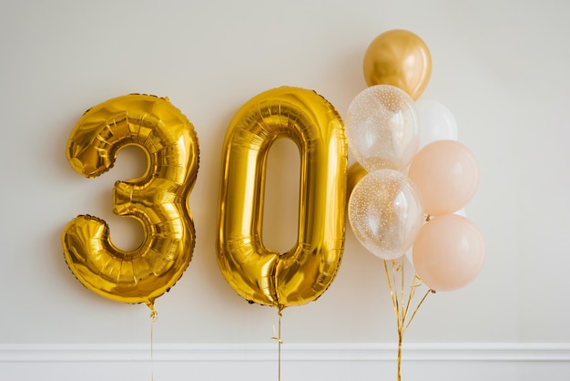 Decor for the celebration of the 30th anniversary Balloons of gold and white color