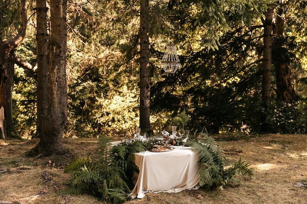 Decor on the festive table, rustic style, decorations on the tables.