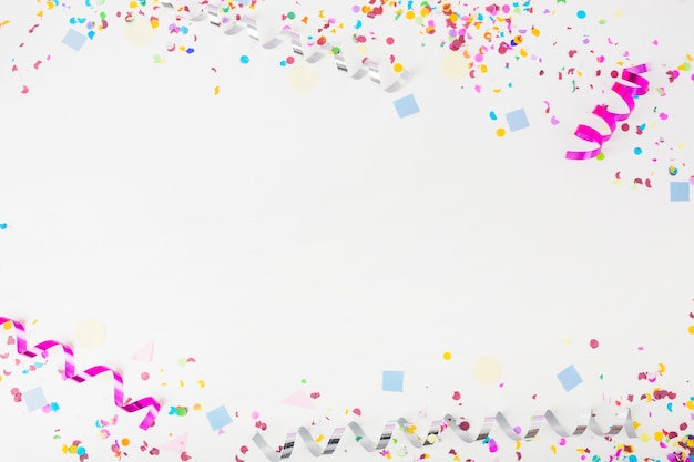 Photo decorated background with confetti and curl streamers