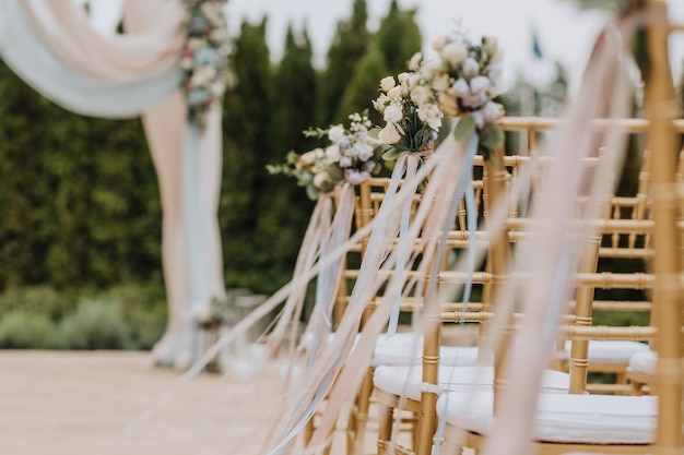 Decorated bouquet of the bride in a chair