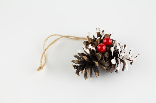 Decorated christmas cones on a white background