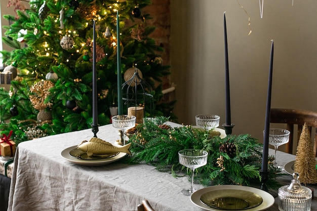 A decorated christmas dining table with christmas tree Restaraunt menu