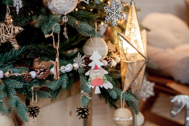 Decorated Christmas tree on blurred sparkling and fairy background