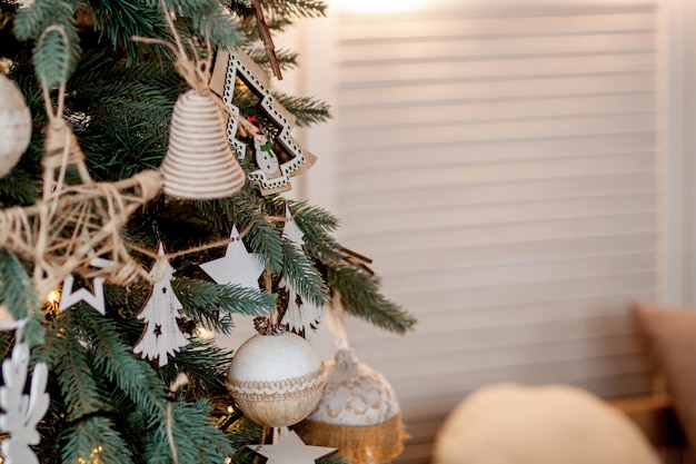 Decorated Christmas tree on blurred, sparkling and fairy