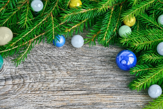  Decorated Christmas tree branches on wooden. 