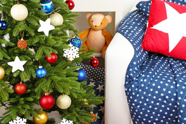 Decorated Christmas tree on home interior