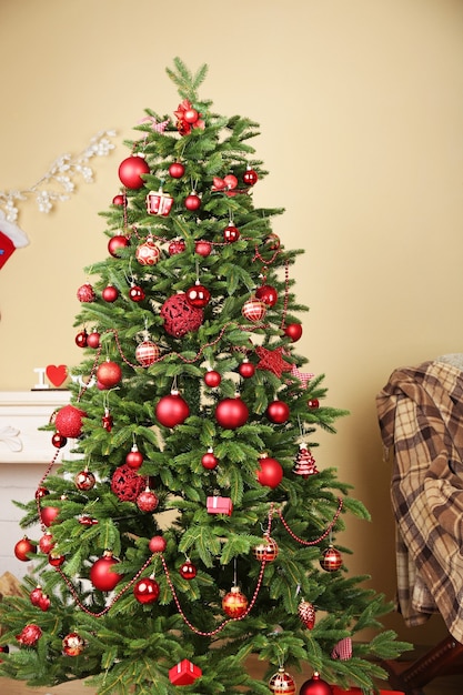 Decorated Christmas tree in room closeup