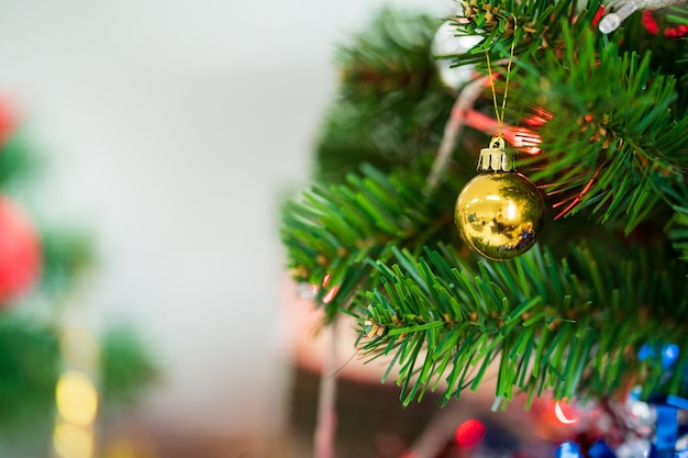 Decorated Christmas tree with blurred bokeh light background. Christmas and New Year concept