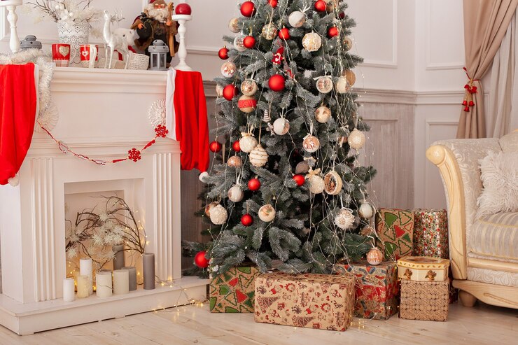 Decorated Christmas tree with gifts and fireplace