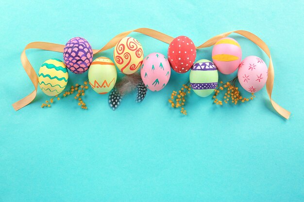 Decorated Easter eggs on color space