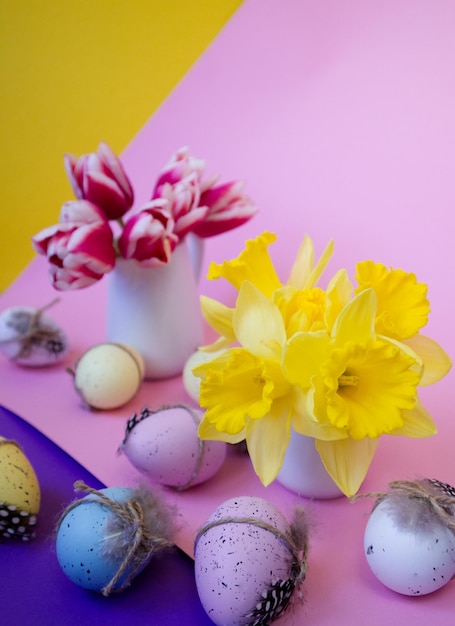 Decorated easter eggs on a multi-colored background close up