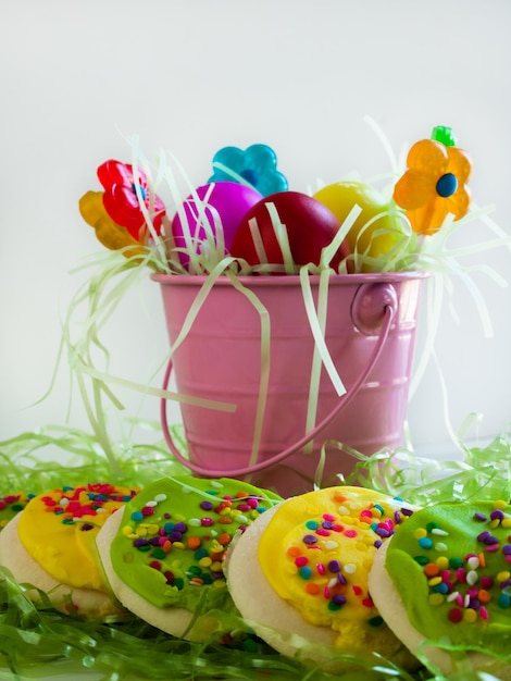 Decorated Easter sugar cookies in grass.