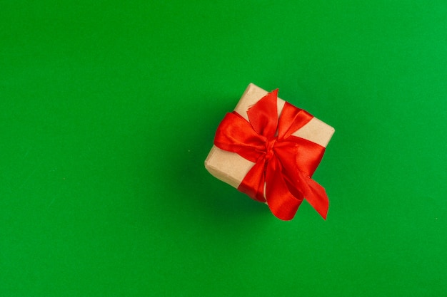 Decorated gift box on a green background