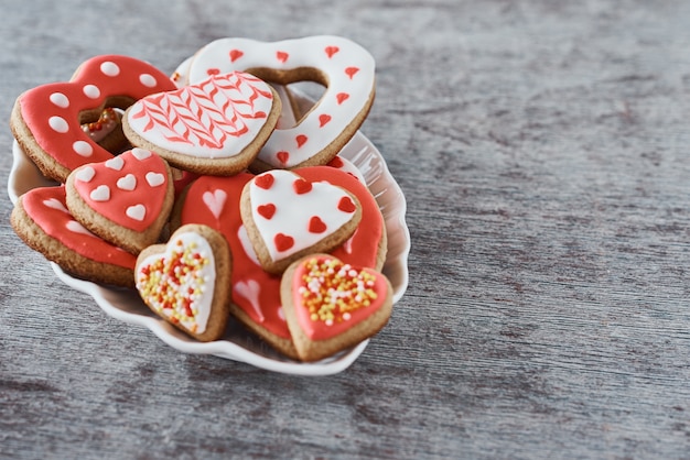 Decorated heart shape cookies in a plate