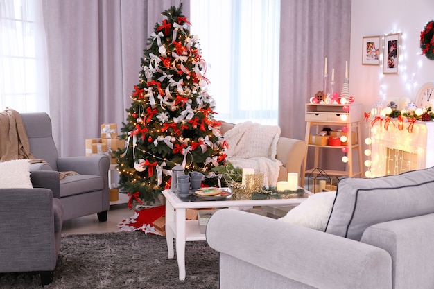 Decorated living room with beautiful Christmas tree