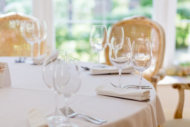 A decorated table in the restaurant on wedding ceremony