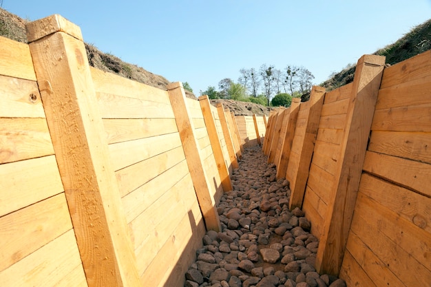 Decorated tree trench for combat in the war, close-up