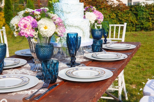 Decorated for wedding elegant dinner table in garden