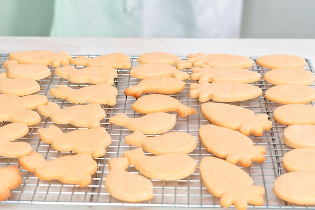 Decorating Easter sugar cookies with rotal icing.