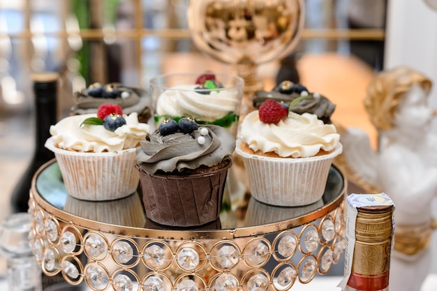 Decoration of a candy bar with various sweets at a festive event desserts on the table